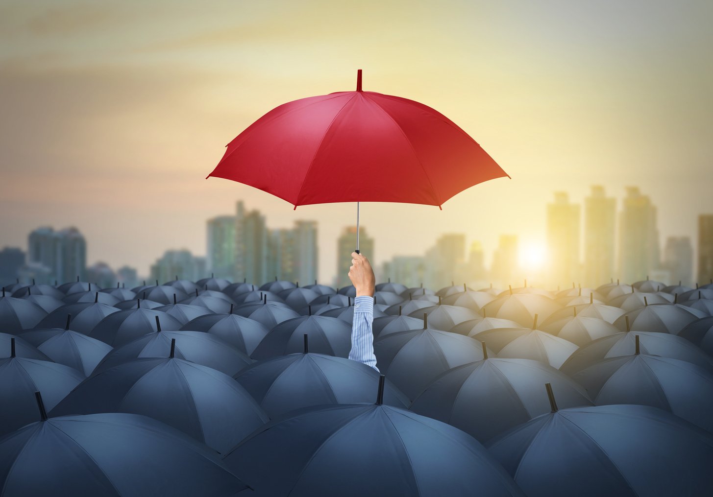businessman with red umbrella among others, unique different concept